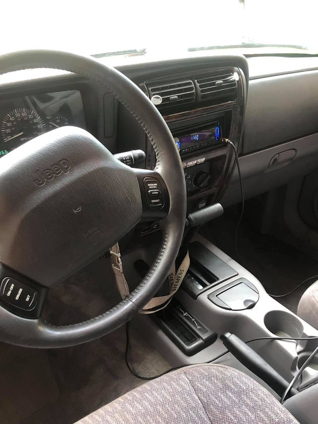 Dash, steering wheel, vents and centre console after the interior detail, all clean and evenly dressed.